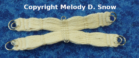 Scale Minaiture Packing Girth -- copyright Melody D. Snow -- unicornwoman.com